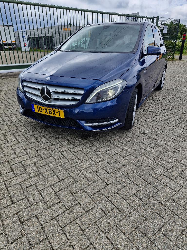 Mercedes-Benz B-Klasse 1.6 B180 5DRS BE Dct7 2012 Blauw, Auto's, 1325 kg, 4 cilinders, Blauw, 122 pk