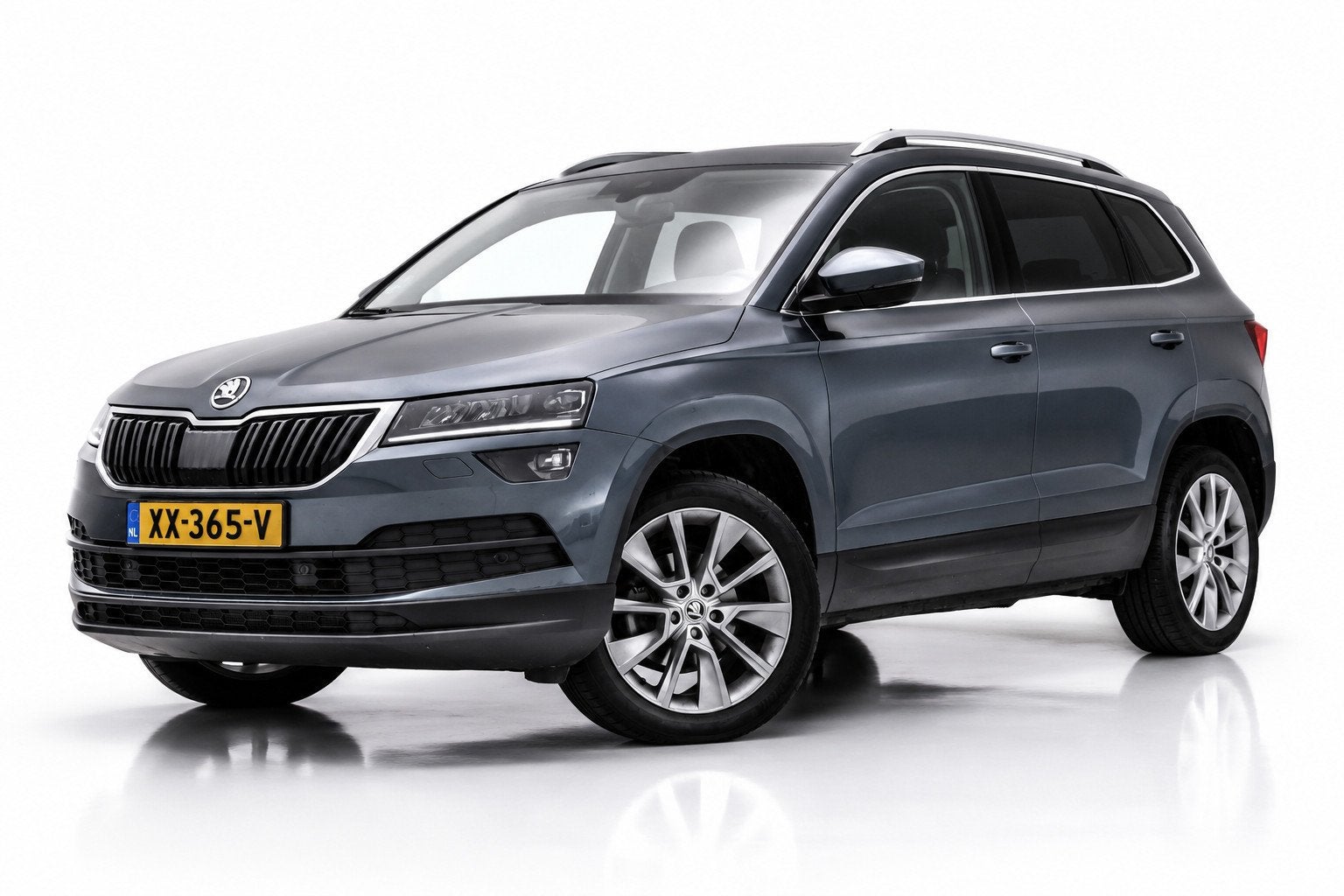 Skoda Karoq 1.5 TSI ACT | VIRTUAL COCKPIT | STOELVERWARMING, Auto's, Stof, 4 cilinders, 150 pk, Bedrijf