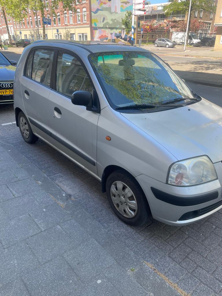 Hyundai Atos 1.1 2004 Grijs, Auto's, Voorwielaandrijving, 31 €/maand, 4 cilinders, Origineel Nederlands