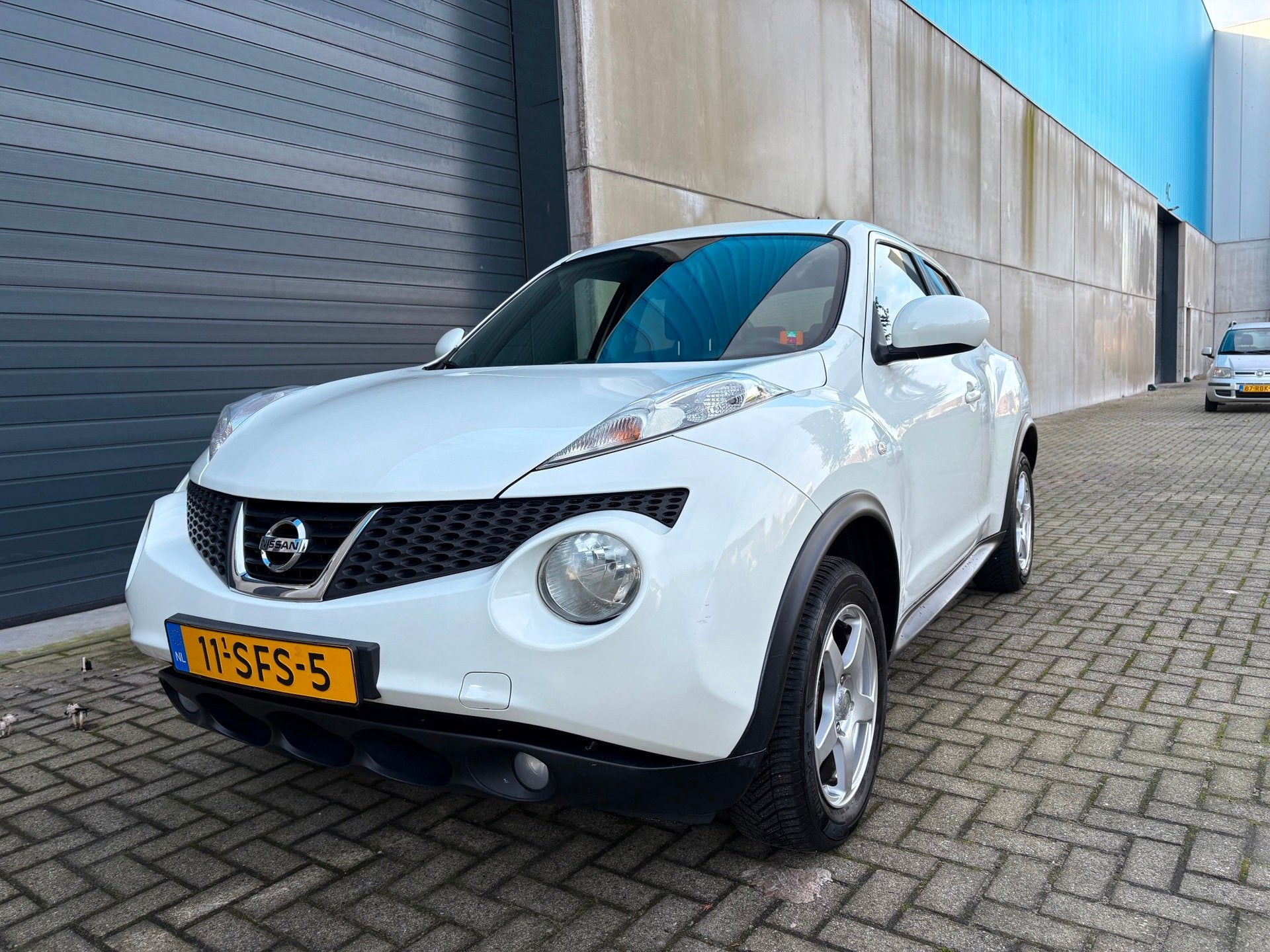 Nissan Juke 1.6i Acenta CLIMA NAVI NAP 2011, Auto's, Voorwielaandrijving, Euro 5, 4 cilinders, Alcantara
