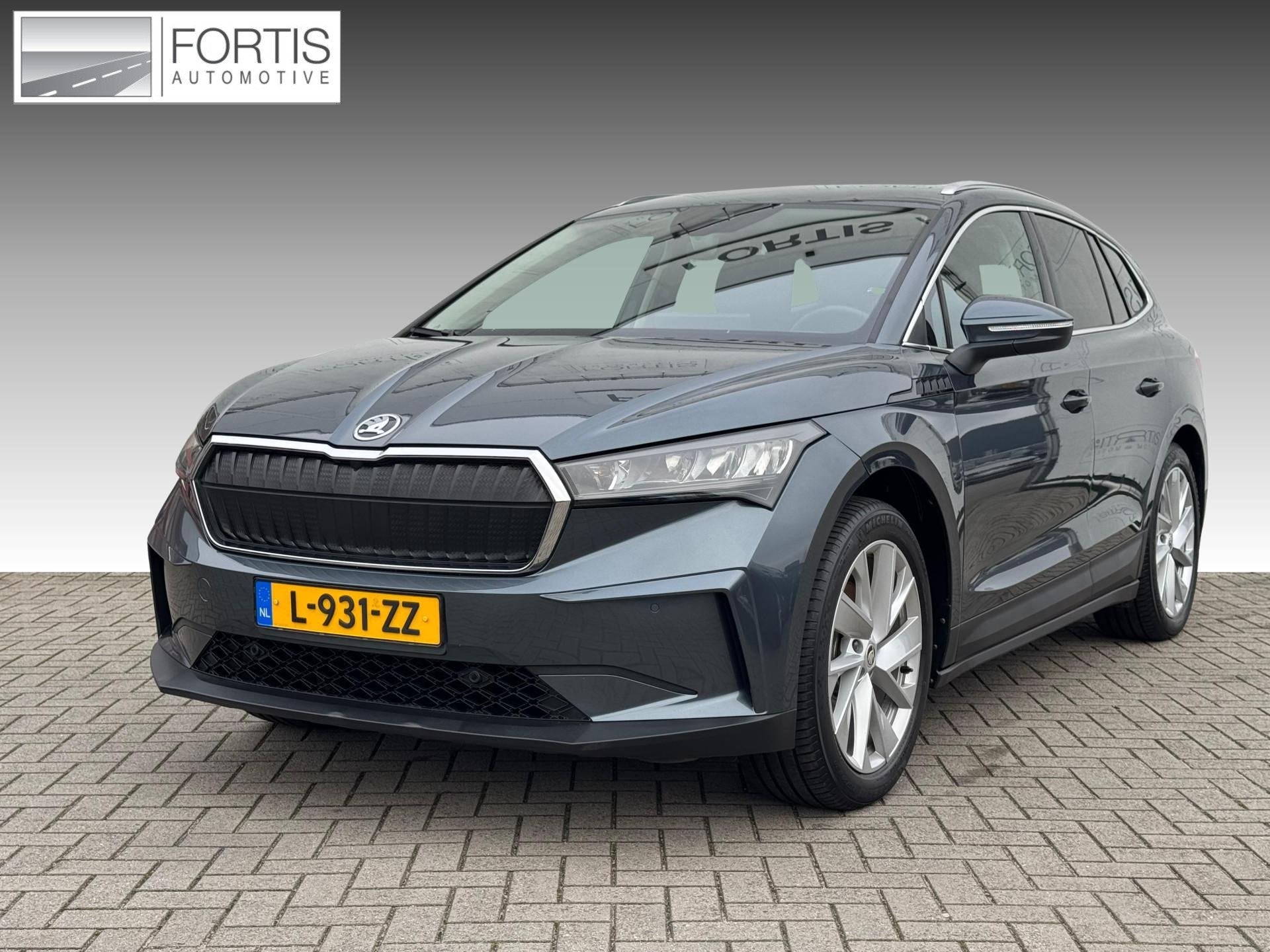 Skoda Enyaq iV 60 LEDER | CAMERA | 20 INCH, Auto's, Gebruikt, Zwart, 1865 kg, Leder en Stof