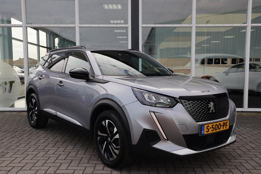 Peugeot 2008 1.2 PureTech Allure|Cruise control|Apple carpla, Auto's, 101 pk, Gebruikt, Euro 6, 1199 cc
