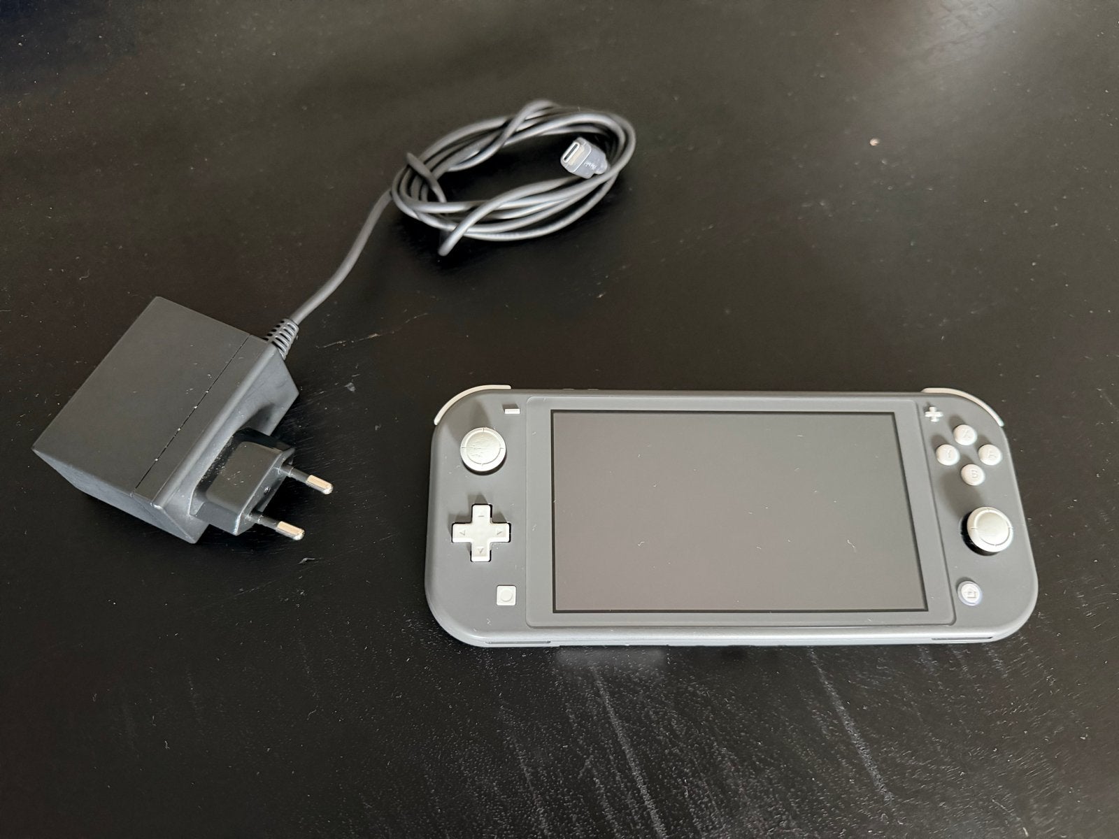 Nintendo Switch Lite Grijs incl. oplader, Spelcomputers en Games, Ophalen of Verzenden, Grijs, Gebruikt
