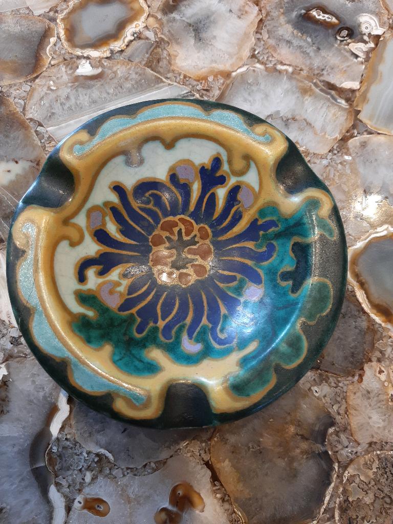 Art nouveau asbak, Ophalen