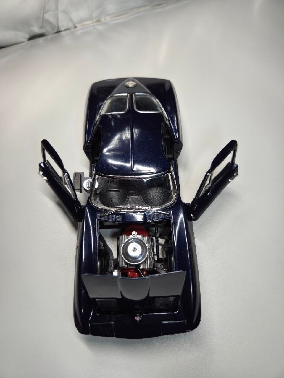 Chevrolet Corvette Stingray  1963   1/18, Hobby en Vrije tijd, Modelauto's | 1:18, Ophalen of Verzenden, Gebruikt, Auto, ERTL