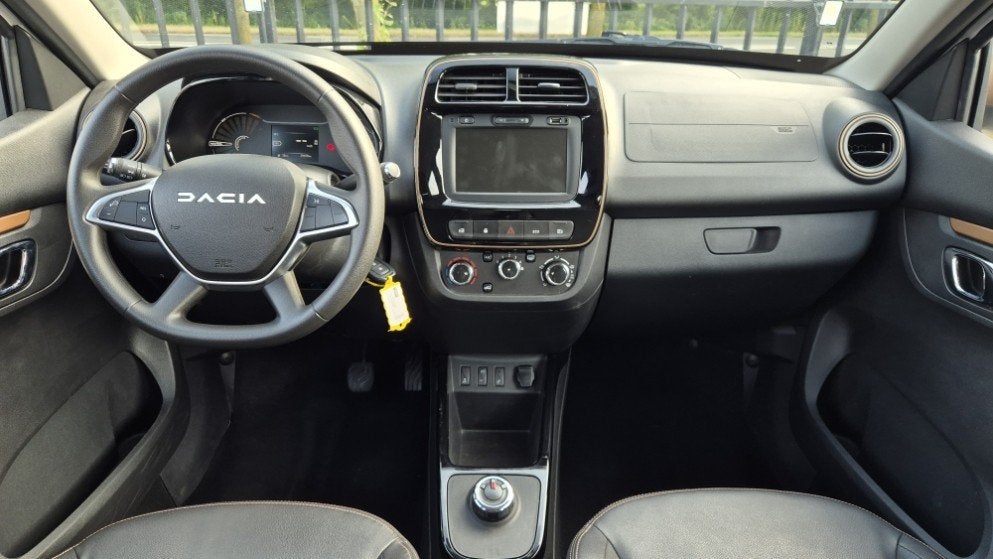 Dacia Spring Extreme 27 kWh | Camera | Navi | PDC | Lichtmet, Auto's, Dacia, Stof, Gebruikt, Huisgarantie, Met garantie (alle)