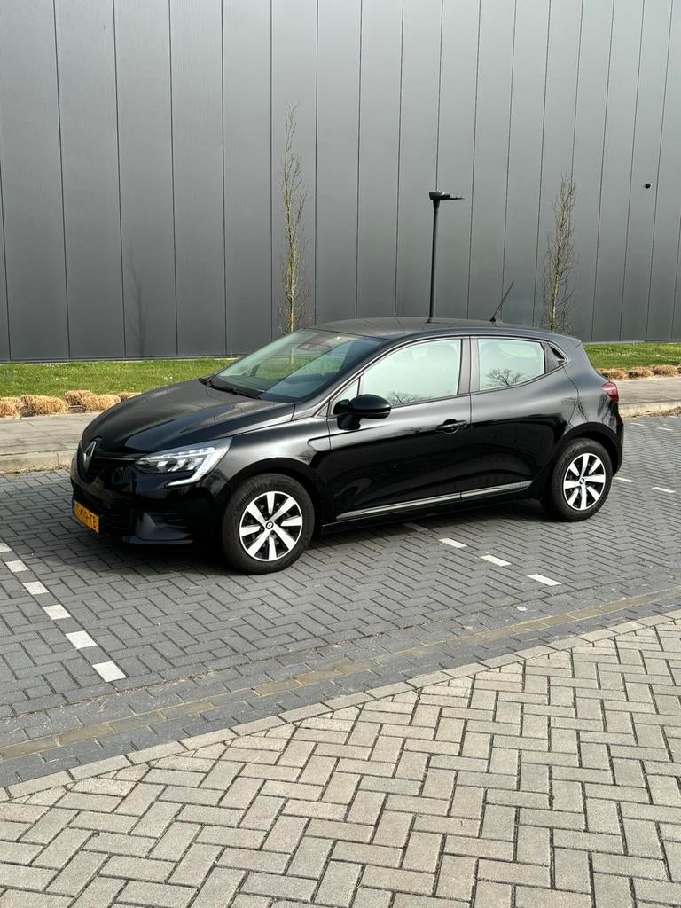 Renault Clio 1.0 TCe 90pk GPF 2023 Zwart 5 deurs HB BTW auto, Auto's, Voorwielaandrijving, Stof, 580 kg, Origineel Nederlands