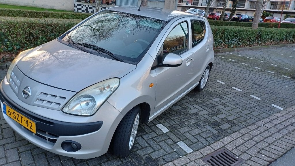 Nissan Pixo 1.0 50KW 5D 2013 Grijs, Auto's, Voorwielaandrijving, Euro 5, Stof, Zwart