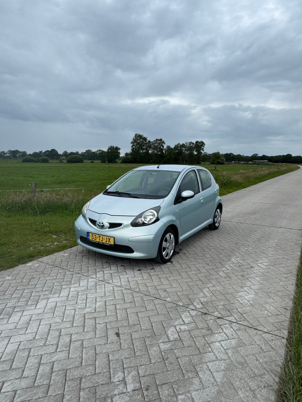 Toyota Aygo 1.0 12V Vvt-i 5DRS 2006 Blauw, Auto's, Toyota, Voorwielaandrijving, 68 pk, Origineel Nederlands, Handgeschakeld