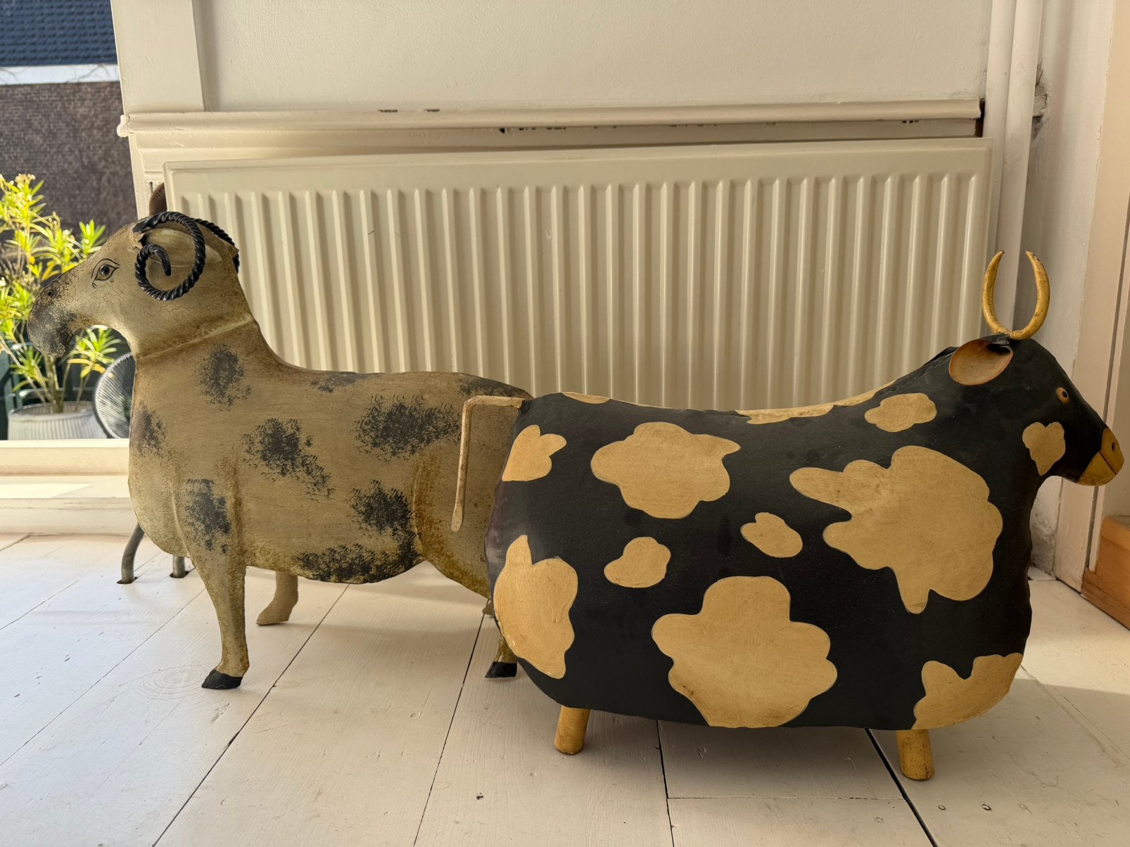 Metalen koe en schaap, Ophalen