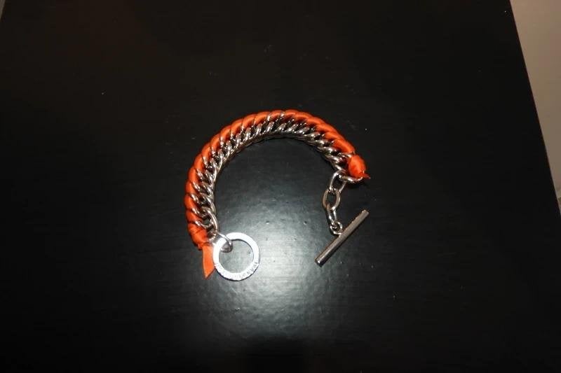 Dyrberg Kern armband zilver kleurig met oranje lintje, Verzenden, Zo goed als nieuw, Zilver, Staal