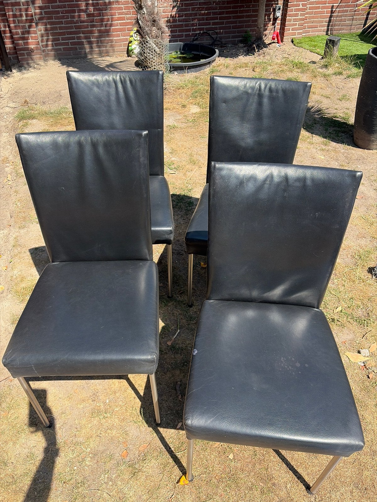 4 zwarte Bert Plantagie eetkamerstoelen, Ophalen, Gebruikt, Zwart, Leer