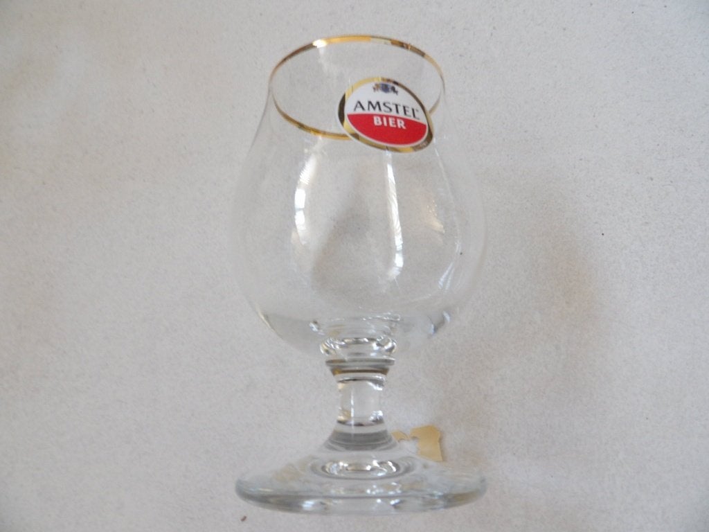 NIEUW 1 mooi AMSTEL bierglas op voet 25 CL, Ophalen of Verzenden, Nieuw, Glas of Glazen, Amstel