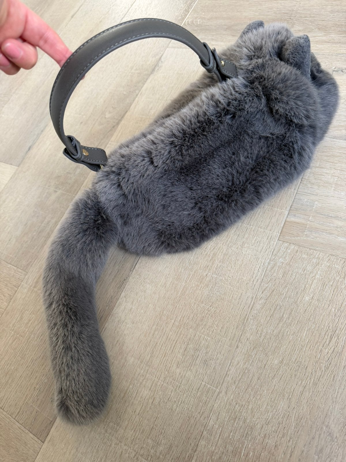 Tas, Ophalen, Handtas