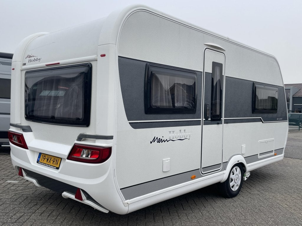 Hobby De Luxe 460 UFE MOVER/VOORTENT/NIEUWSTAAT, Caravans en Kamperen, Hobby, Bedrijf, 4 tot 5 meter, Tot en met 4