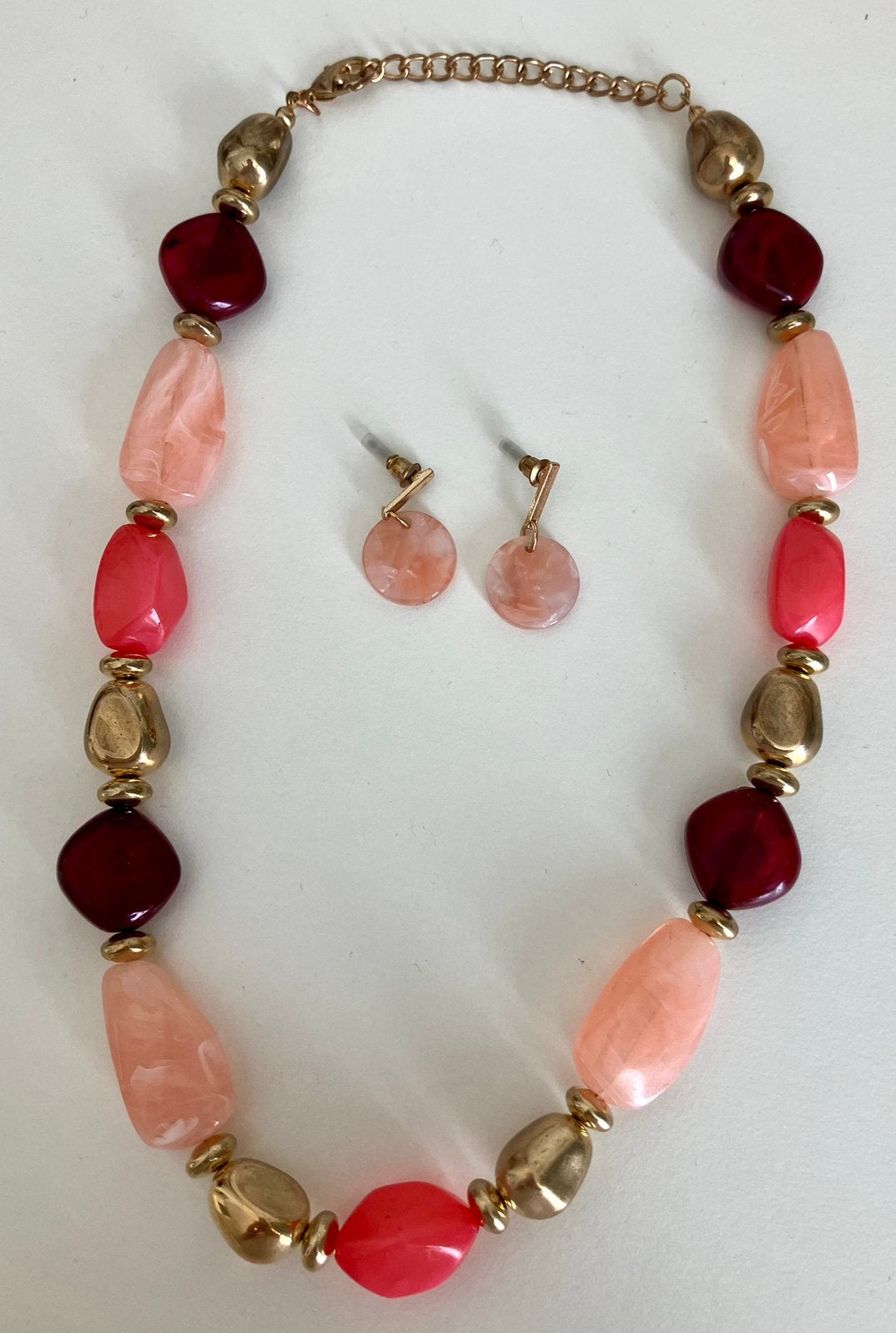 Nieuwe ketting en oorbellen Hema roze bordeaux goud, Ophalen, Zo goed als nieuw, Roze