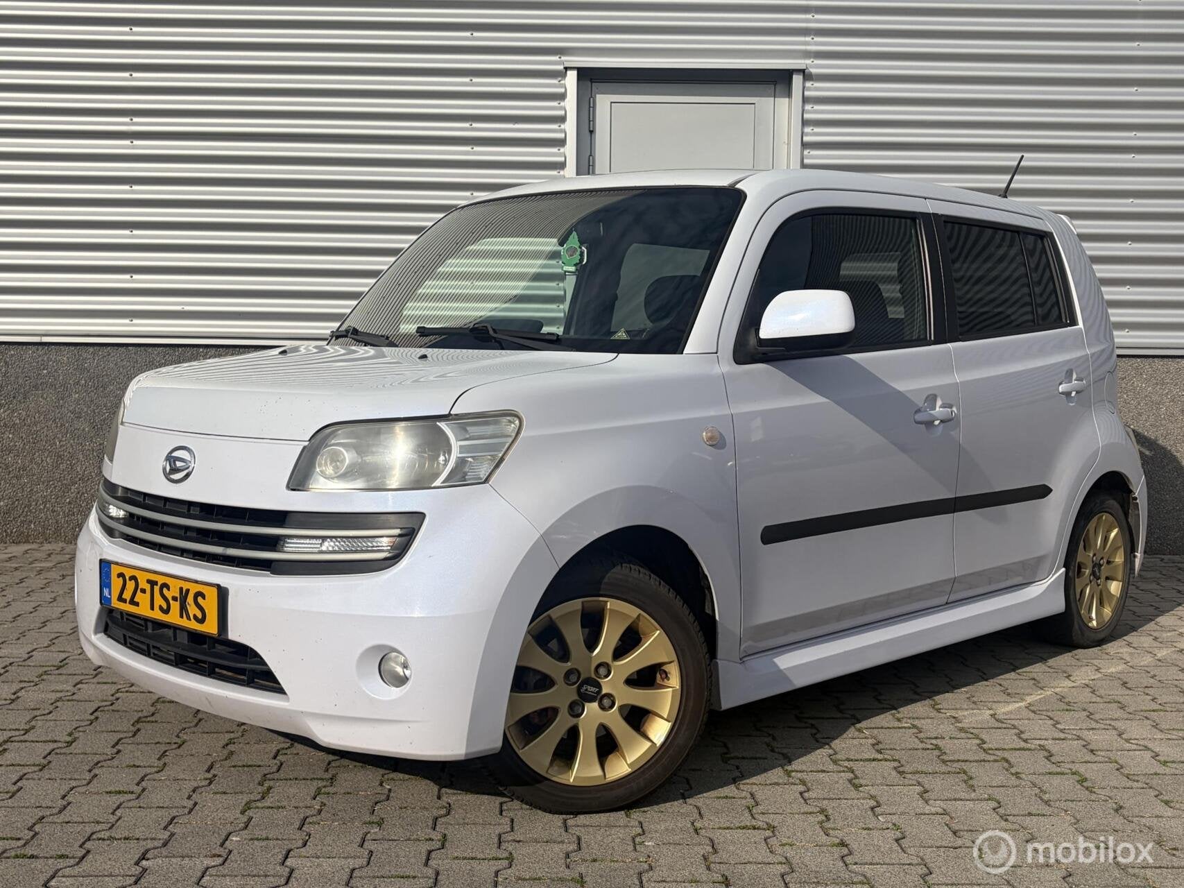 Daihatsu Materia 1.5 Soul Cruise-Airco-Camera, Auto's, Voorwielaandrijving, Stof, Zwart, Wit