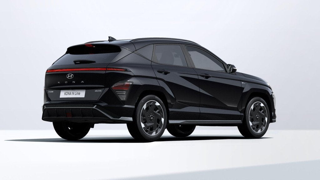 Hyundai Kona Electric N Line Business 64.8 kWh | DIRECT UIT, Auto's, Hyundai, 12 maanden, Stof, 750 kg, Zwart