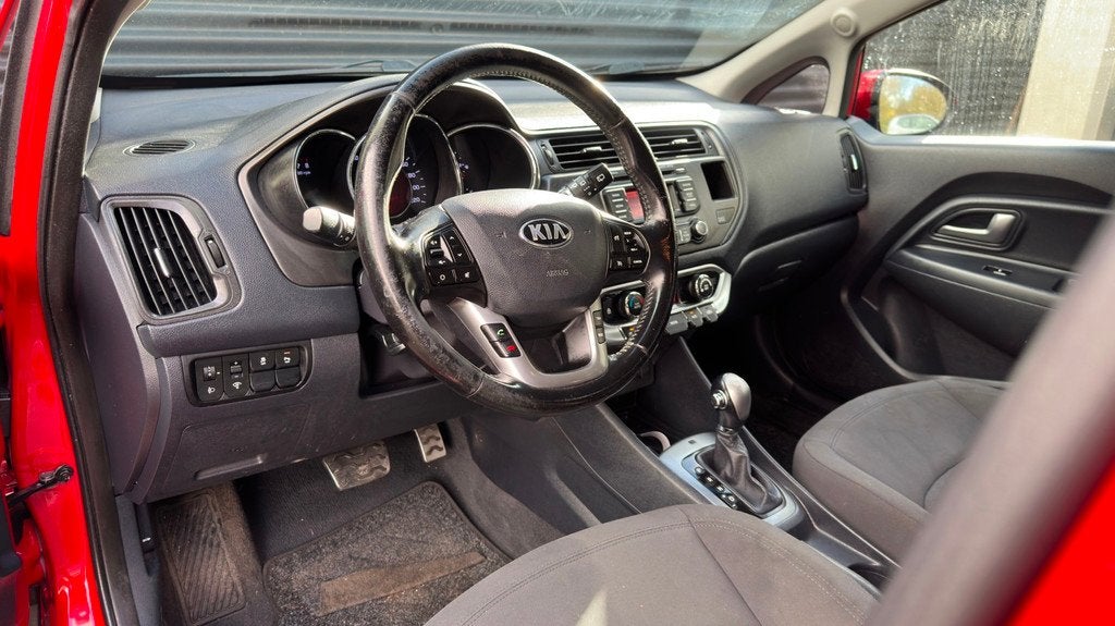 Kia Rio 1.4 CVVT Super Pack | Automaat | Cruise | Bluetooth, Euro 5, Gebruikt, Zwart, 4 cilinders