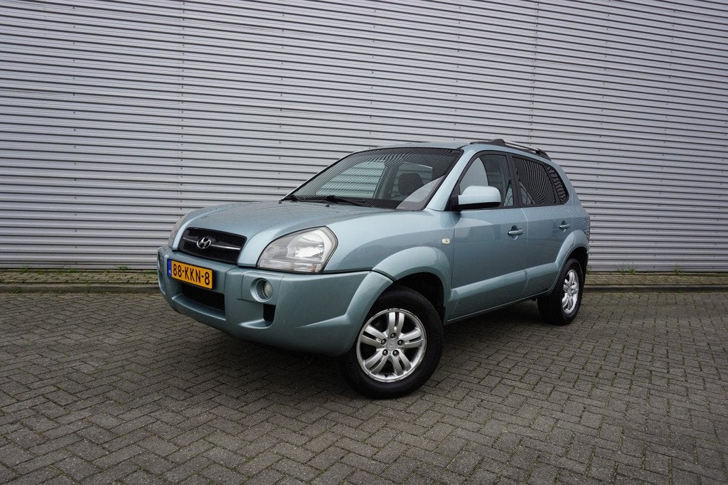 Hyundai Tucson 2.0i Style Executive Climate / Navi / Cruise, Auto's, Hyundai, Parkeersensor, Stof, Gebruikt, 4 cilinders