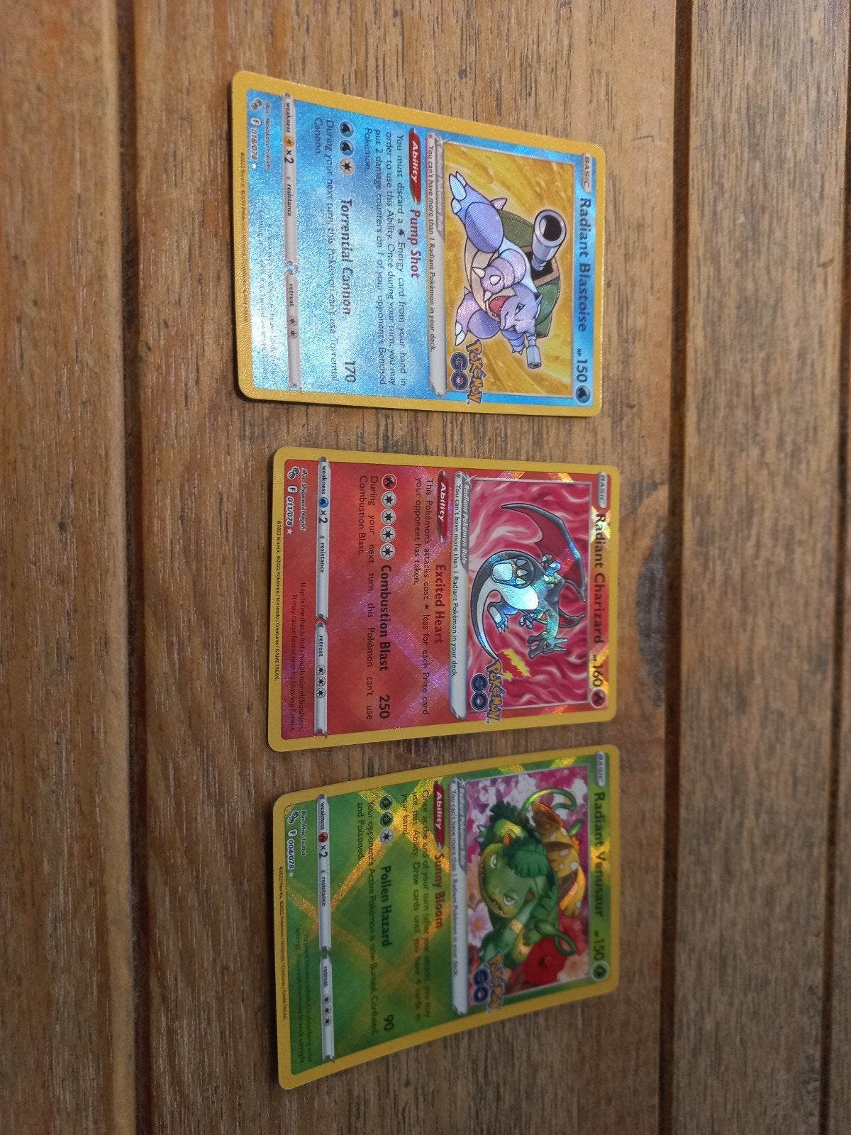 radiand setje  charizard blastoise en venusaur, Ophalen of Verzenden, Zo goed als nieuw, Meerdere kaarten, Foil