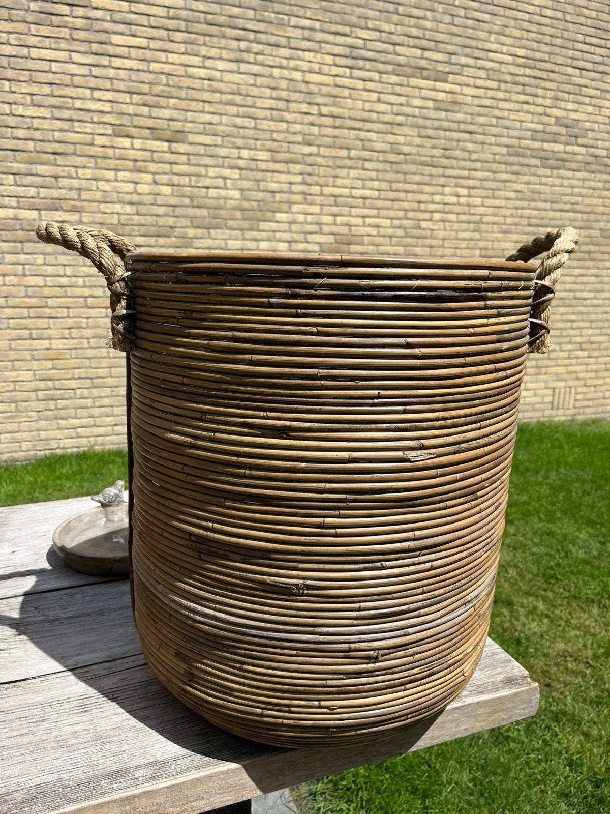 Rotan basket bloempot 50 cm hoog, Ophalen, Zo goed als nieuw, Riet
