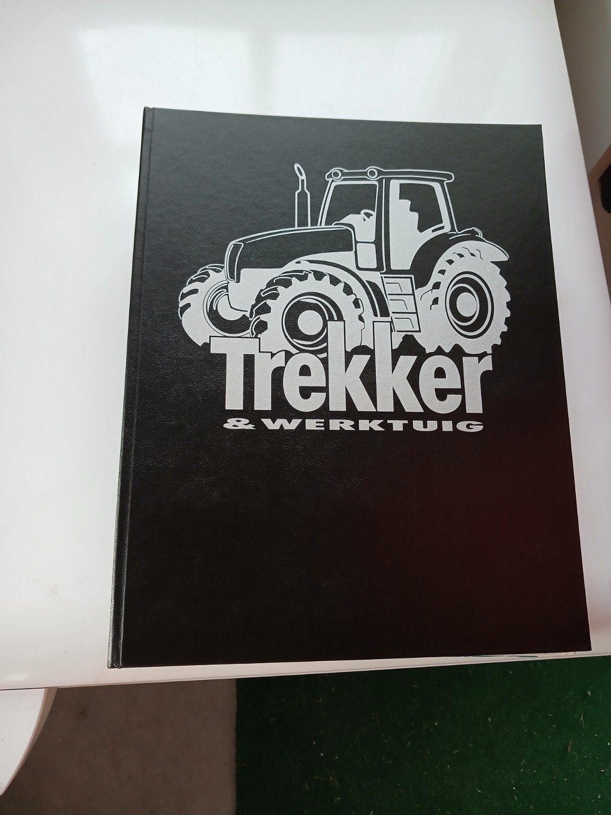 Trekker en werktuig, Ophalen, Gelezen, Folder