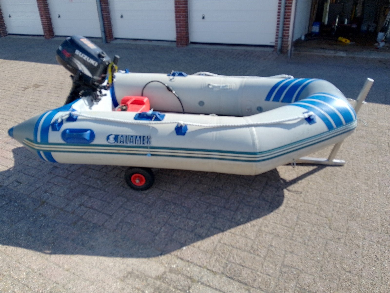 Rubberboot strandkar 5 pk Suzuki, Ophalen, Peddels