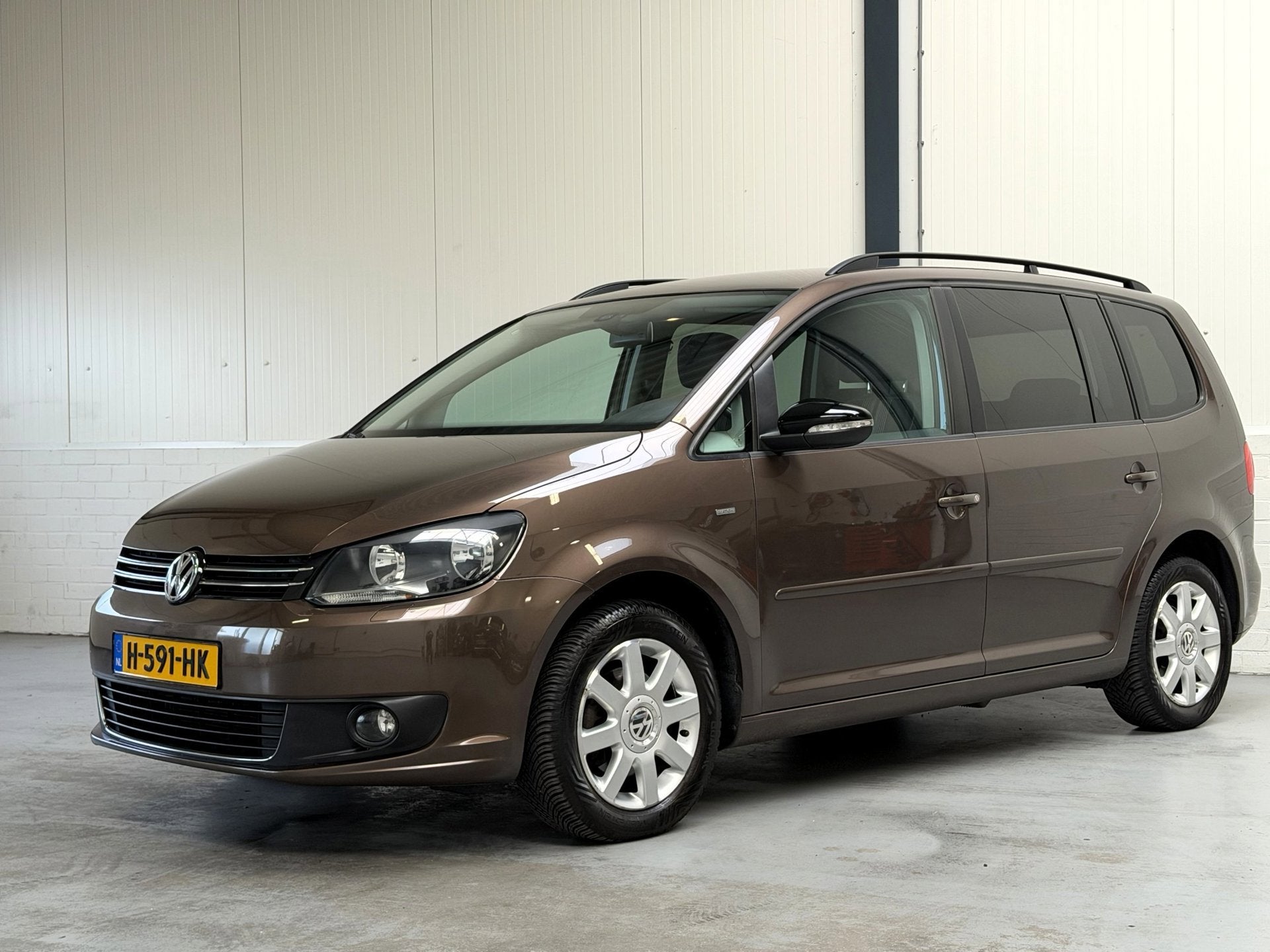 Volkswagen Touran 1.2 TSI Highline BlueMotion 7p., Voorwielaandrijving, Euro 5, Automatische klimaatregeling, Gebruikt