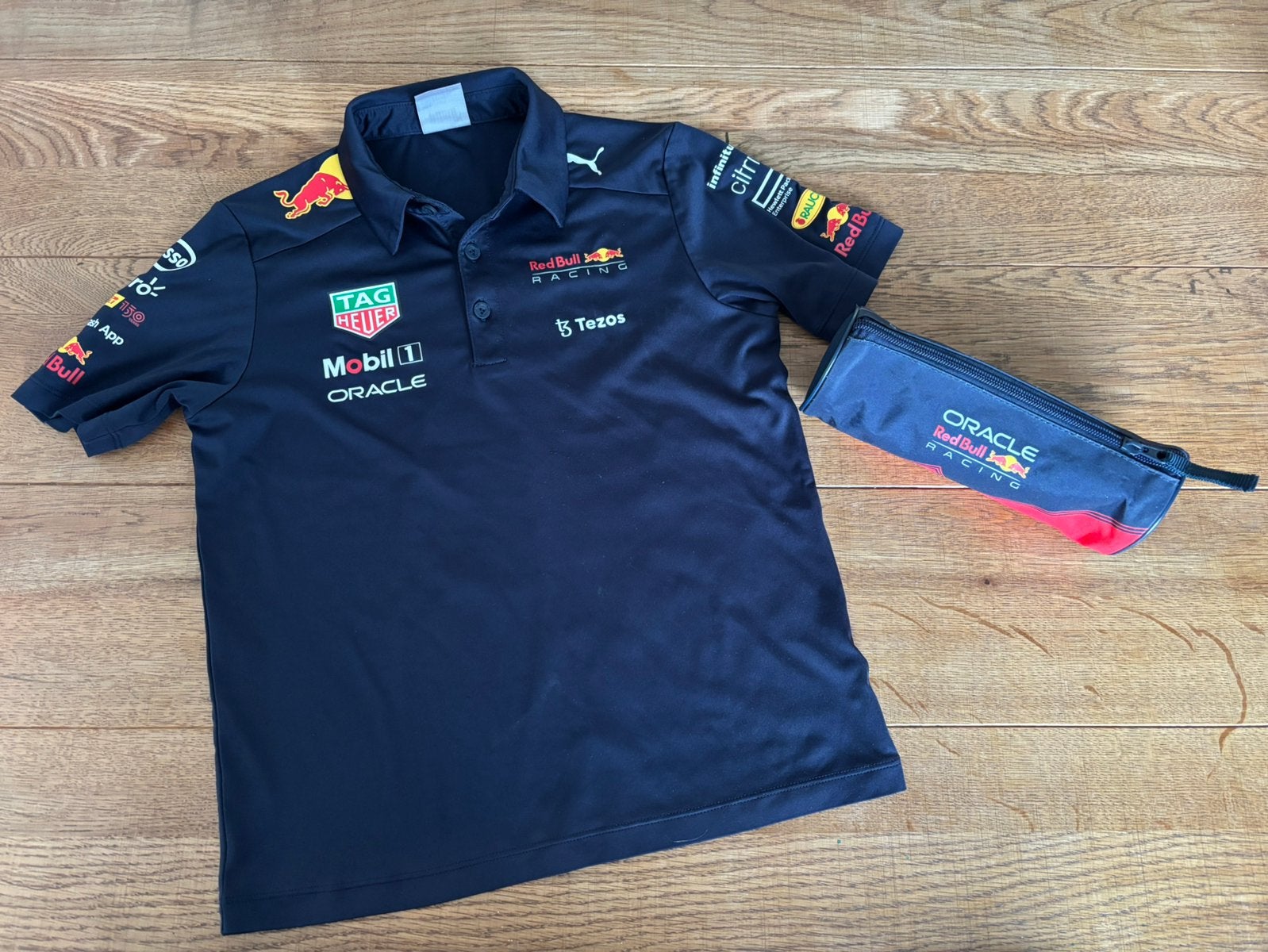Puma Red Bull Racing polo maat 140 plus etui, Ophalen of Verzenden, Zo goed als nieuw, Jongen, Shirt of Longsleeve