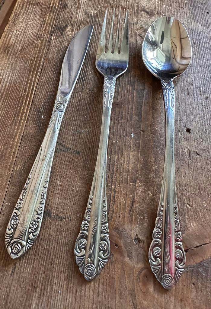 Vintage K.W.V. Rostfrei bestek rozenpatroon  24-delige set, Ophalen of Verzenden