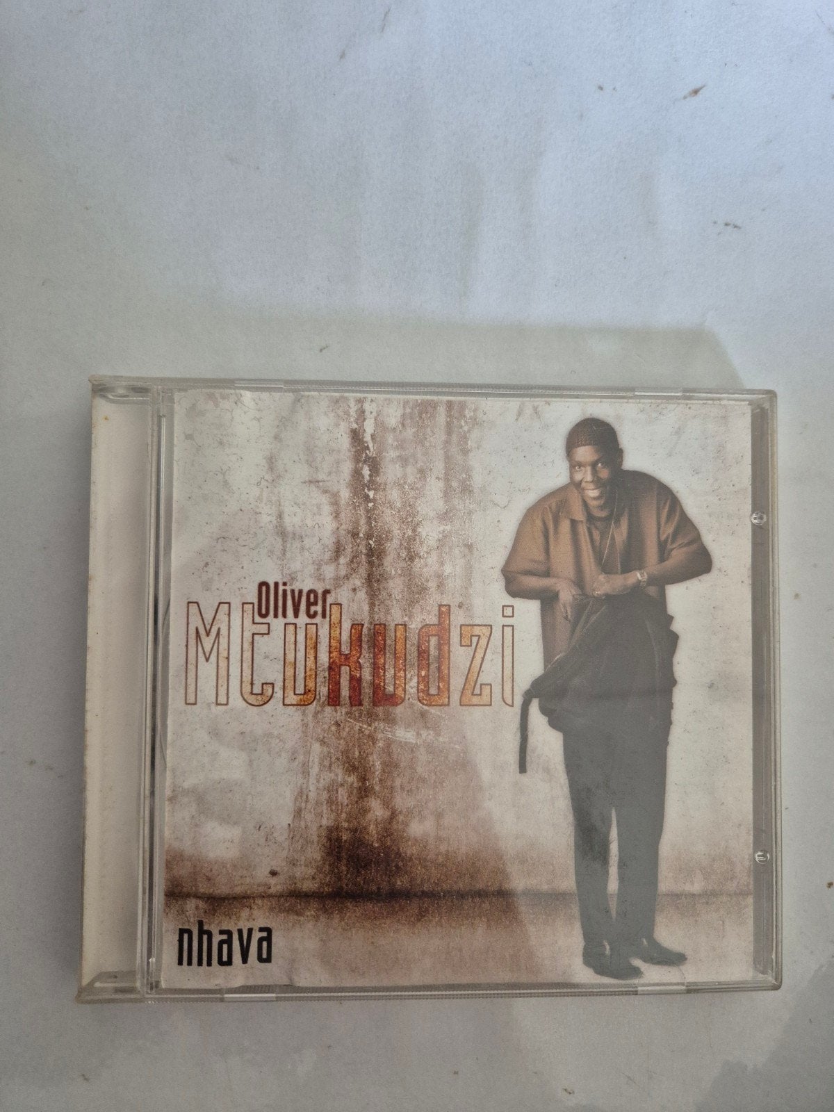 Oliver Mtukudzi - Nhava. Cd. 2004
South Africa pressing
Code, Ophalen of Verzenden