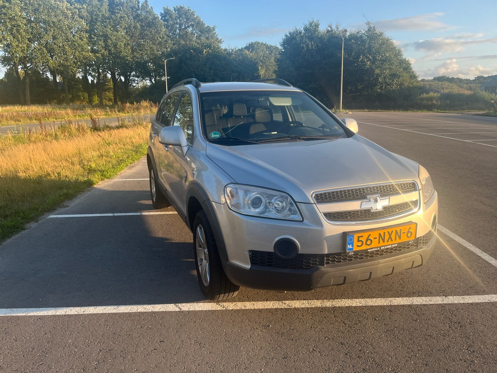 Chevrolet Captiva 2.4 2WD 2011 Grijs, 136 pk, 4 cilinders, 7 stoelen, Handgeschakeld