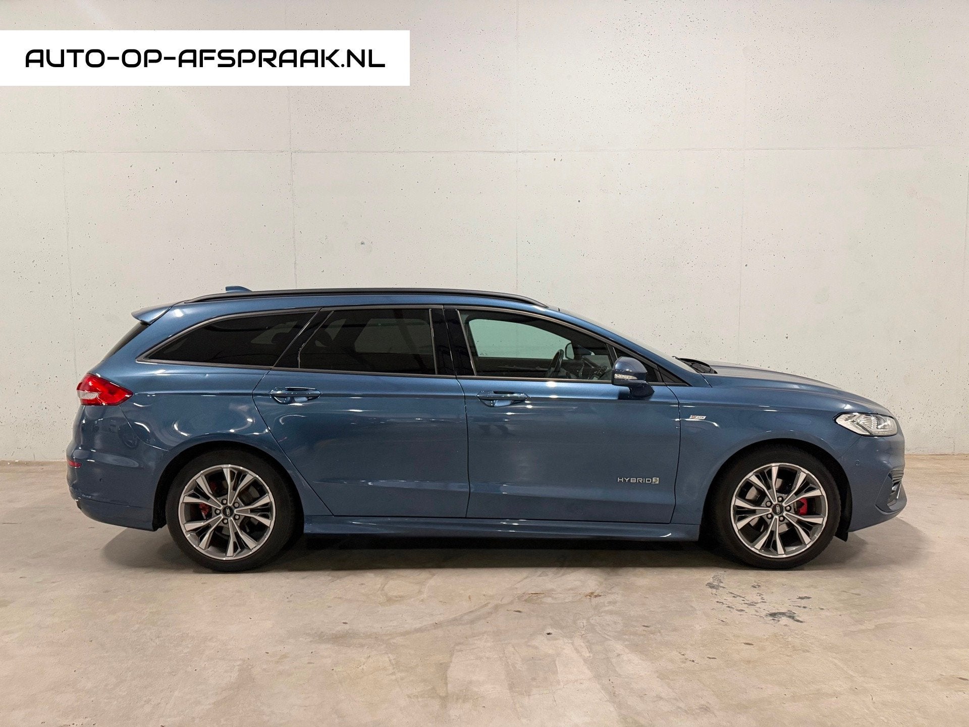 Ford Mondeo Wagon 2.0 IVCT HEV ST-Line Navi Camera Clima Cru, Gebruikt, 4 cilinders, Mondeo, Blauw
