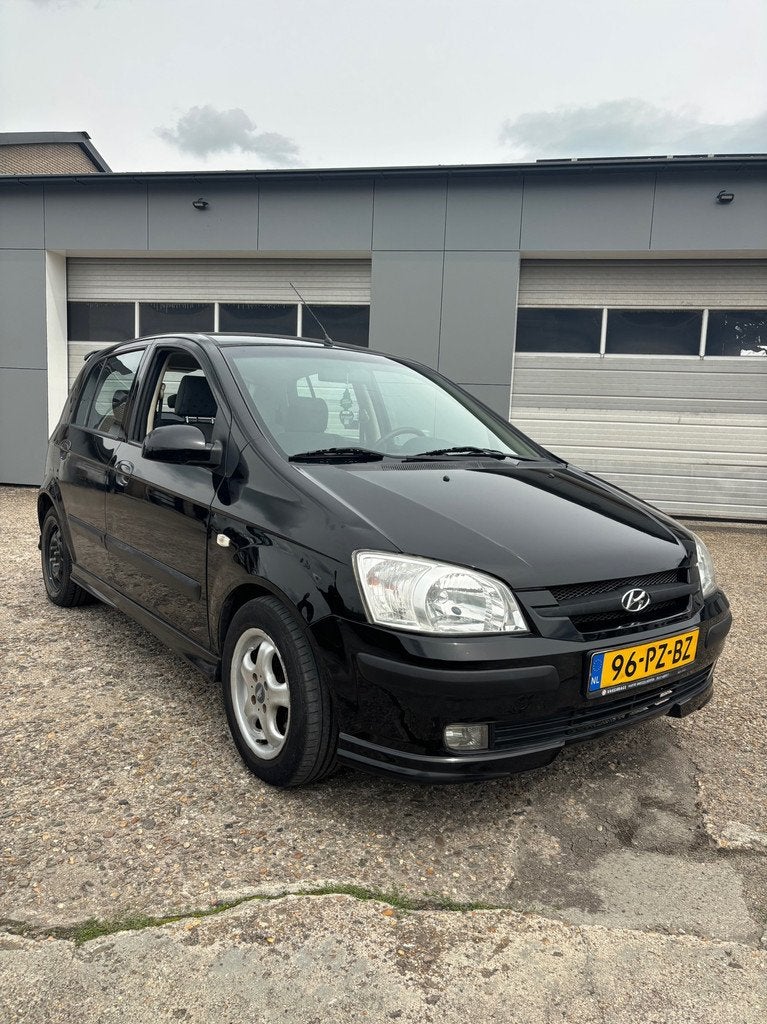 Hyundai Getz 1.6i-16V GLS Sound, Auto's, Hyundai, Voorwielaandrijving, 4 cilinders, Zwart, Origineel Nederlands