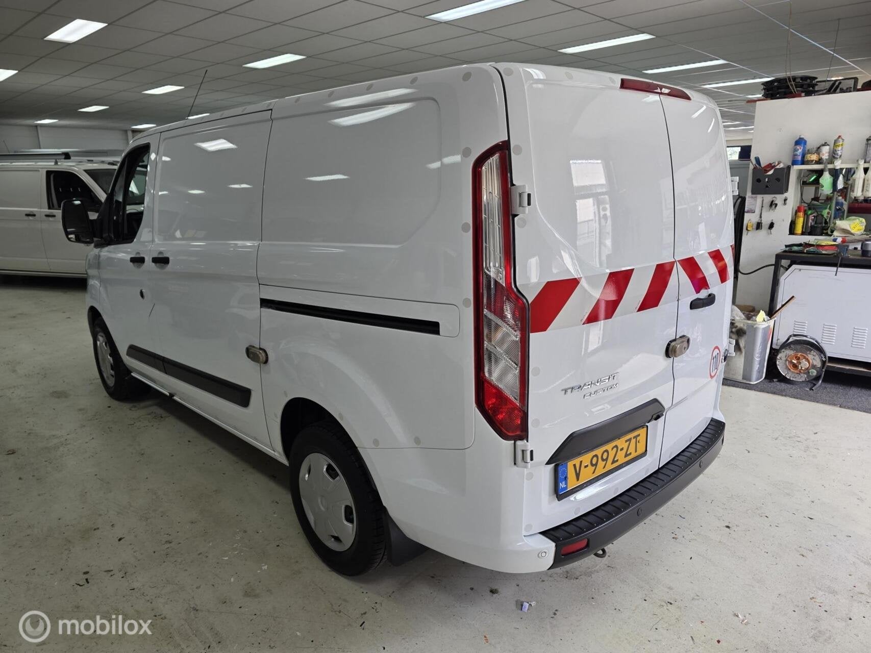 Ford Transit Custom 300 2.0 TDCI L1H1 Airco Cruise, Gebruikt, 4 cilinders, Wit, Origineel Nederlands