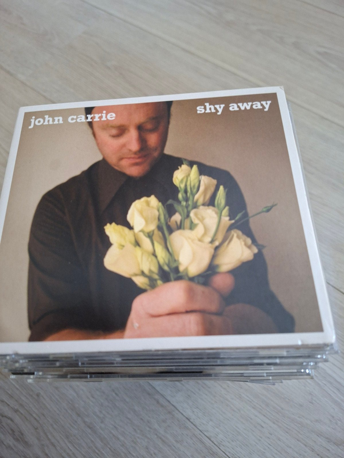 John Carrie - Shy Away, Cd's en Dvd's, Cd's | Pop, Zo goed als nieuw, Ophalen of Verzenden
