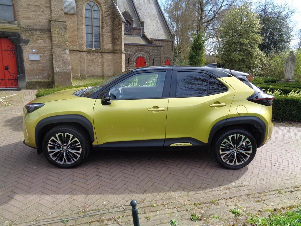 TOYOTA Yaris Cross 1.5 VVT-I Hybrid 116pk CVT Adventure Edit, Auto's, Toyota, 12 maanden, Gebruikt, Overige kleuren, Leder en Stof