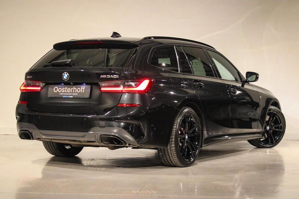 BMW 3-serie Touring M340i xDrive High Executive PANO | LASER, Auto's, BMW, 1780 kg, Gebruikt, Zwart, Zwart