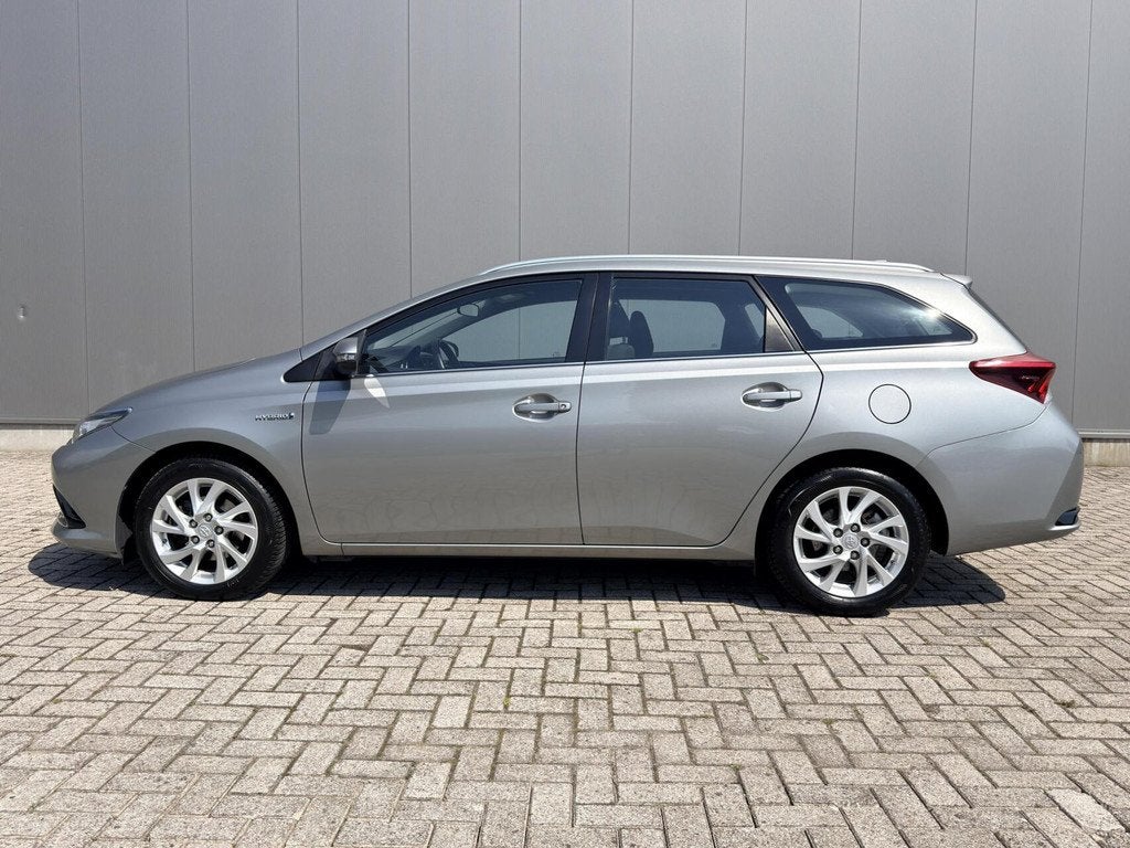 Toyota Auris 1.8 Hybrid Business Plus*Climate|Camera|Cruise|, Gebruikt, Euro 6, Met garantie (alle), Hybride Elektrisch/Benzine