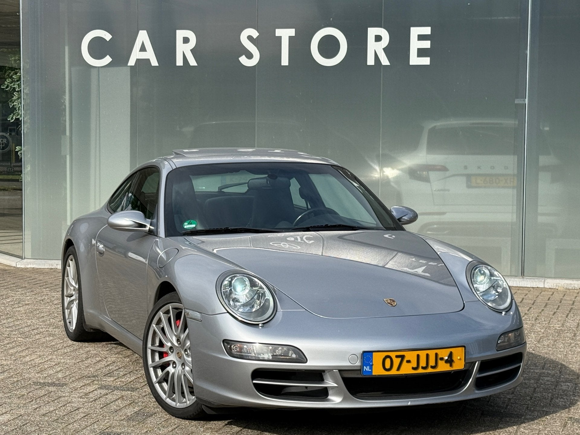 Porsche 911 3.8 Carrera S Schuifdak|Bose|Memory|Navigatie, Automaat, Dealer onderhouden, Achterwielaandrijving, Gebruikt