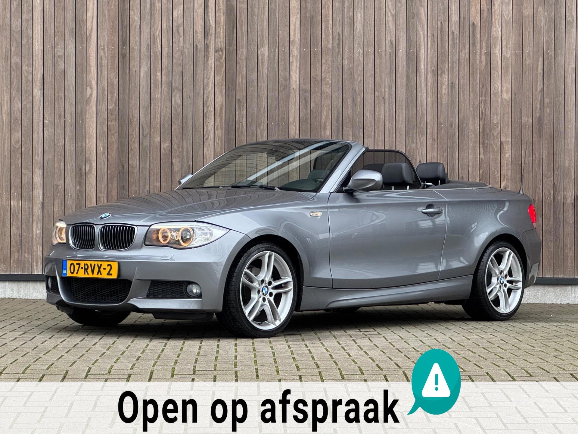 BMW 1-serie Cabrio 118i High Executive M-Sport, Auto's, BMW, Euro 5, Achterwielaandrijving, Zwart, Cabriolet