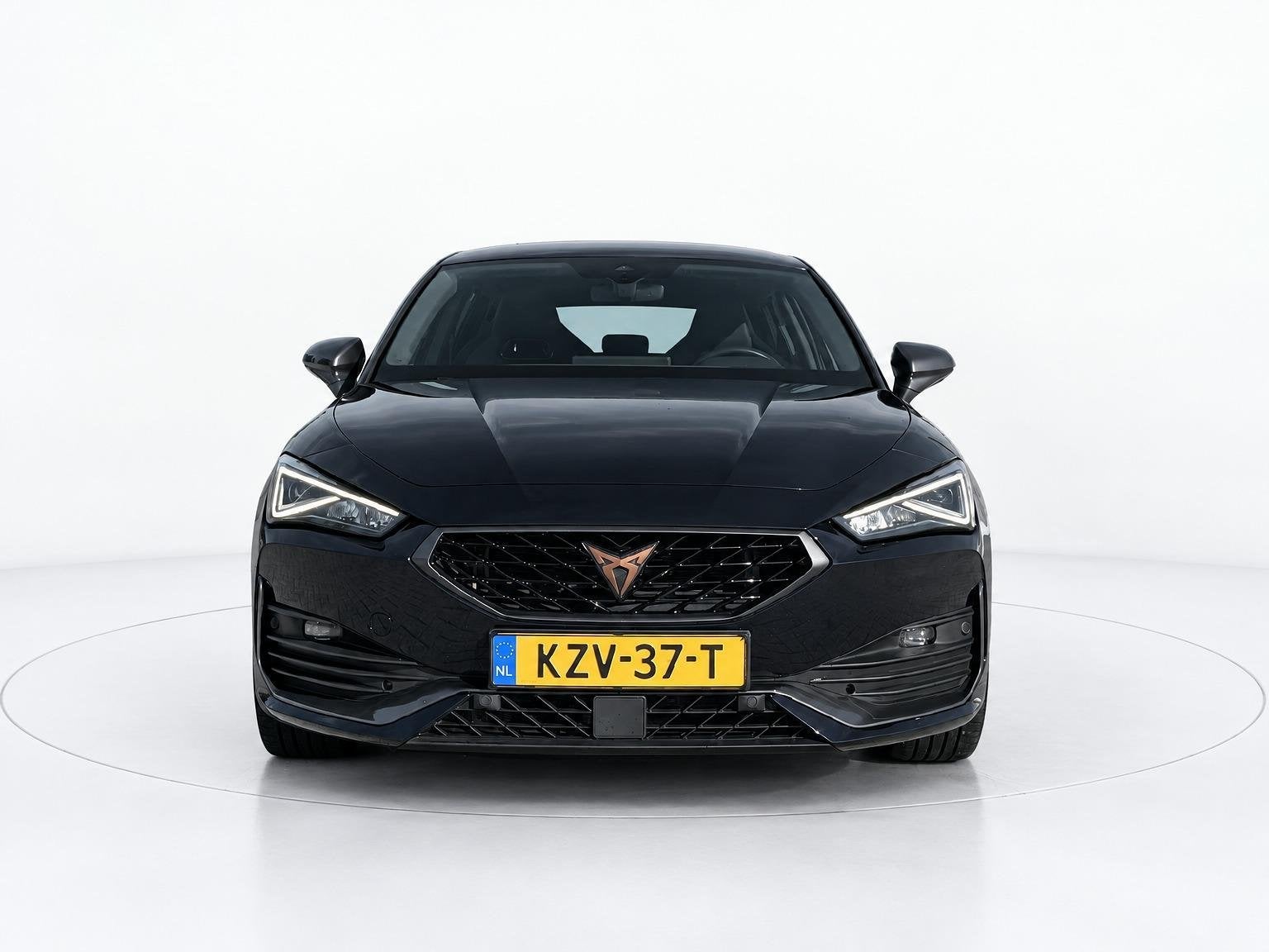 CUPRA Leon 1.4 e-Hybrid Business MEMORY - CAMERA - CRUISE, Auto's, Stof, Gebruikt, 4 cilinders, Verwarmde buitenspiegels