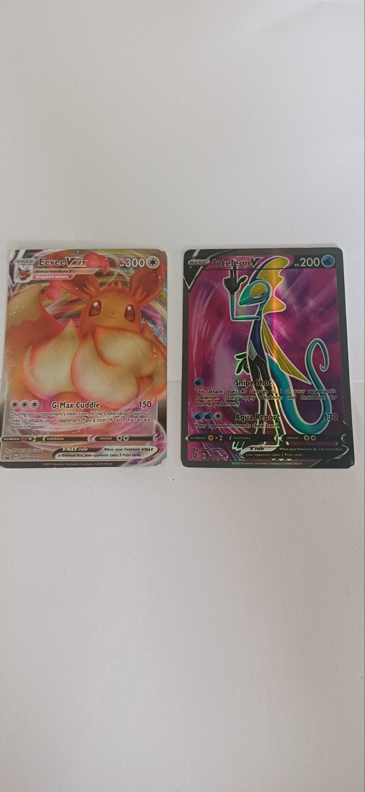 Eevee Vmax en inteleon V, Hobby en Vrije tijd, Verzamelkaartspellen | Pokémon, Ophalen, Zo goed als nieuw