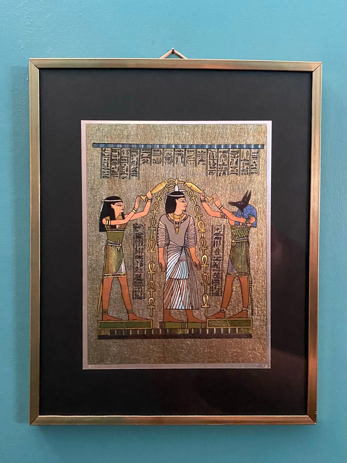 Ingelijste Egyptische papyrus met hiërogliefen, Ophalen