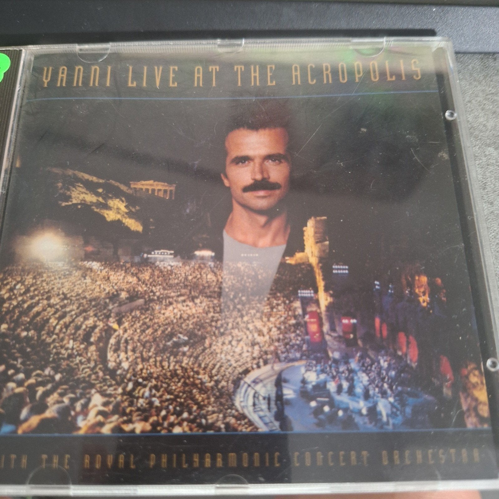 Yanni Live At The Acropolis CD - Zo goed als nieuw, Ophalen of Verzenden, Zo goed als nieuw, Live-album, Inclusief boekje