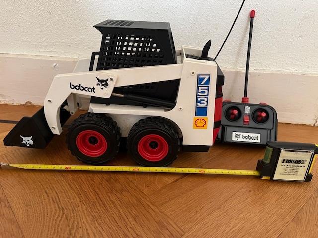 Afstandbestuurbare Bobcat, 30 cm, werkt niet meer, Ophalen of Verzenden, Gebruikt, Overige schalen, Auto onroad