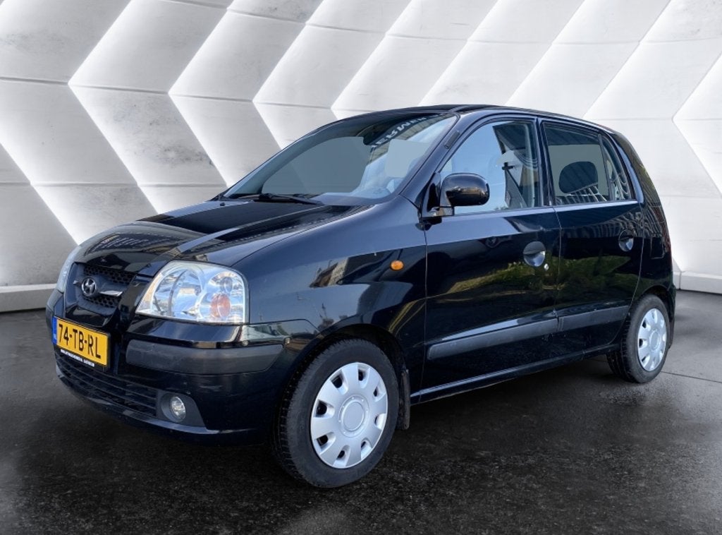 Hyundai Atos 1.1i Dynamic AUTOMAAT (bj 2006), Auto's, Hyundai, Stof, 31 €/maand, 4 cilinders, Zwart