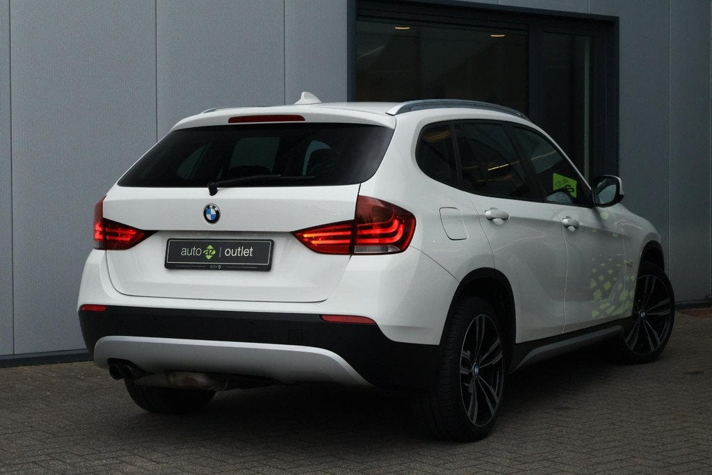BMW X1 xDrive20i Business / Pano / Stoelverwarming, Auto's, BMW, Euro 5, Stof, Gebruikt, 4 cilinders