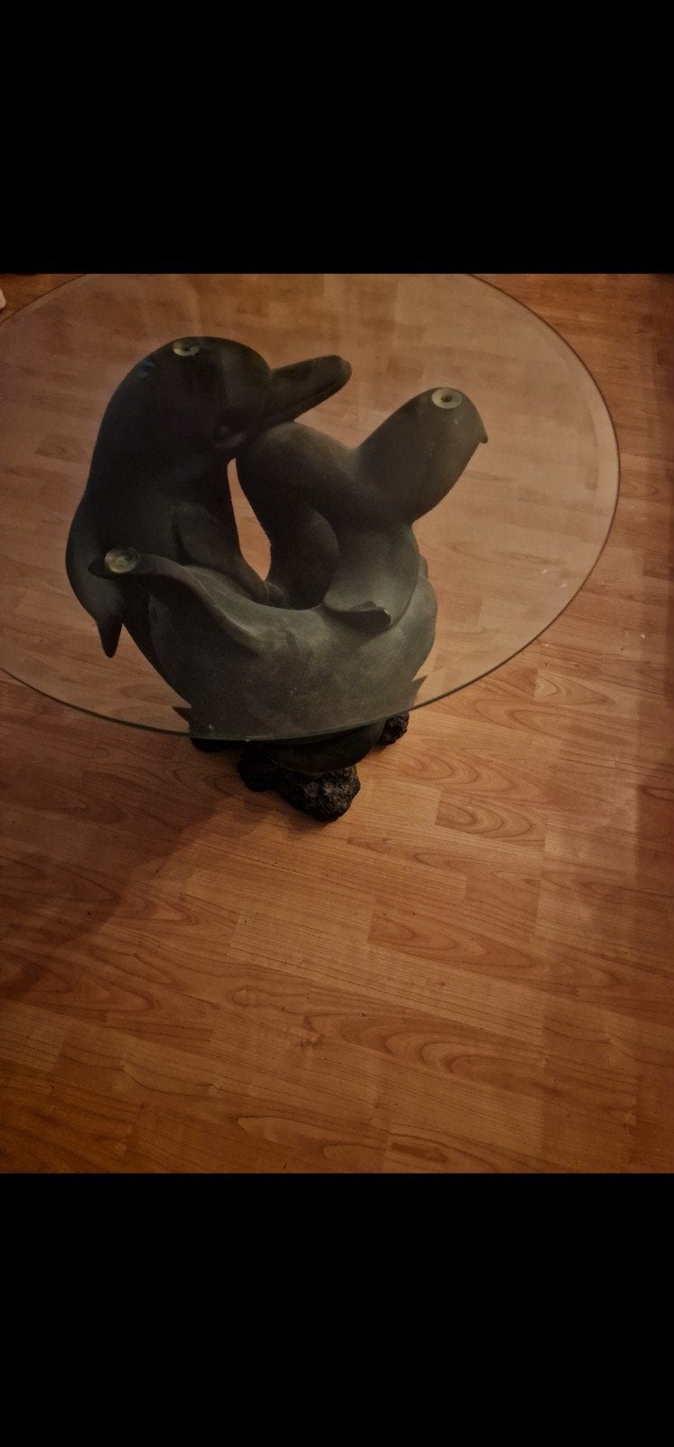 dolfijnen tafeltje, Ophalen